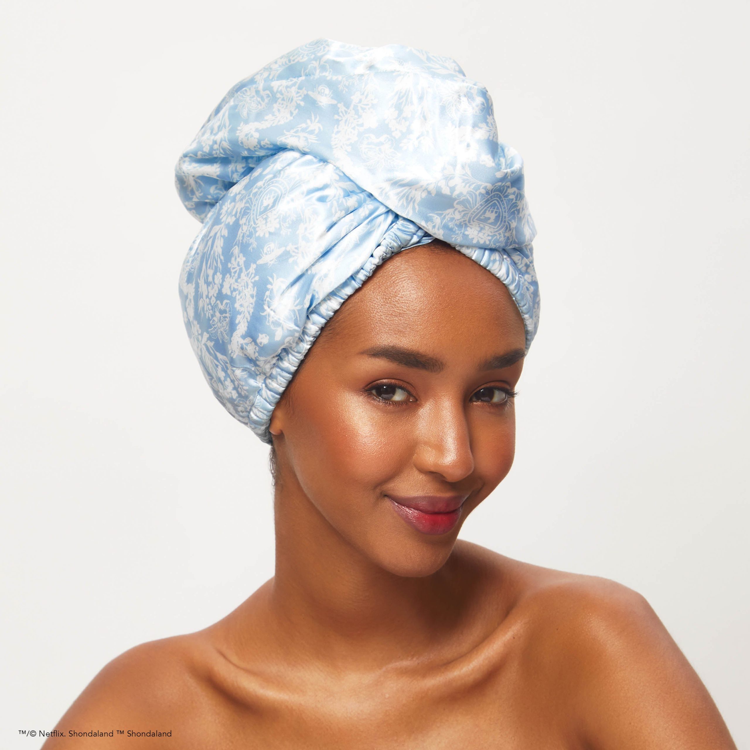 63610-BridgertonxKitsch-SatinWrappedHairTowelTurban-ToileDeBlue-Model-1280x1280px_5921cb8e-82a9-4a2a-830c-1020c0bd3ffa-scaled-1.jpg