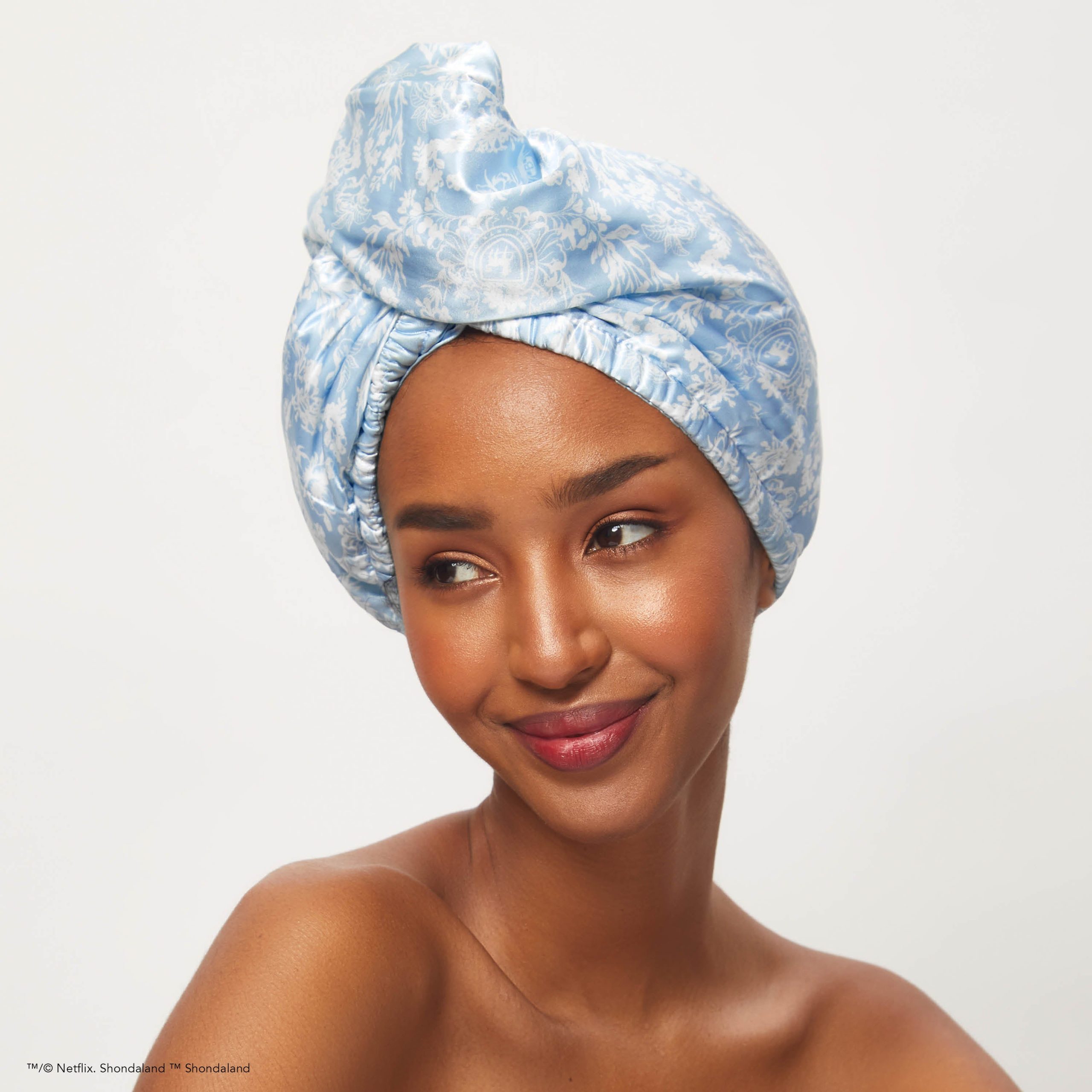 63610-BridgertonxKitsch-SatinWrappedHairTowelTurban-ToileDeBlue-Model-6-1280x1280px_633af545-4bb9-4c91-86e4-f3d095058a4c-scaled-1.jpg