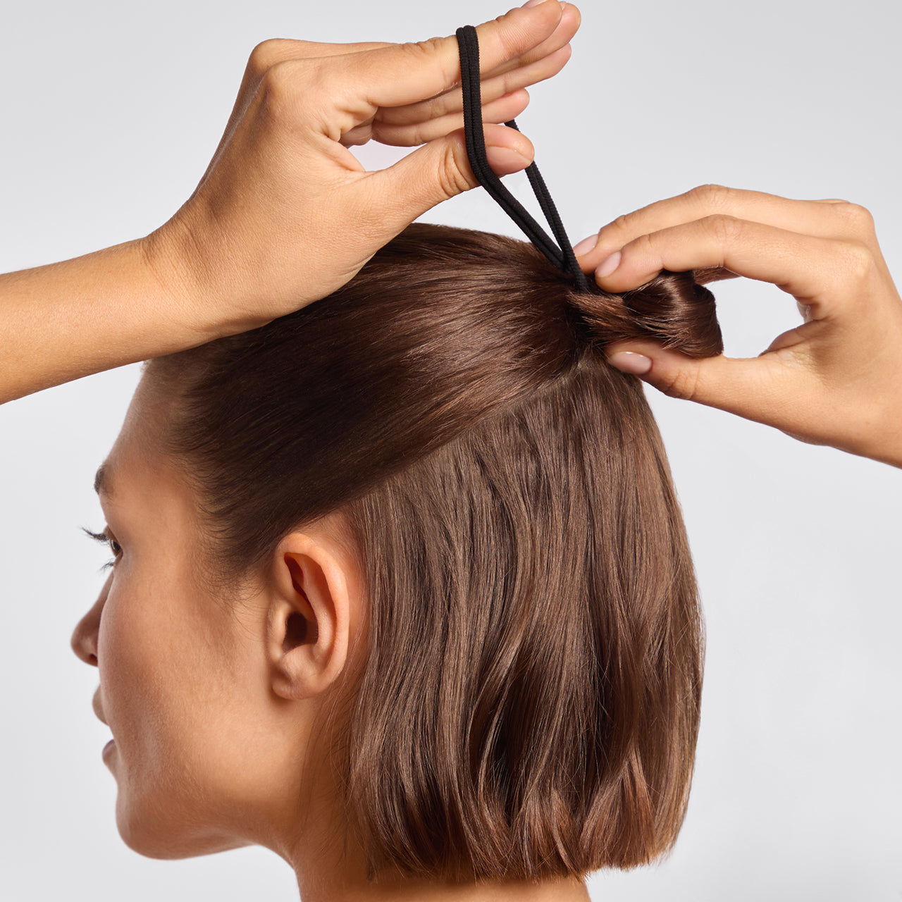 68899-SeamlessHairElastics-8pc-Hair-Black-Model-1280x1280px.jpg